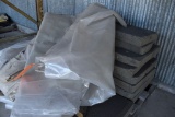 PALLET OF PLASTIC SHEETING AND FOAM BLOCKS