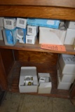 ASSORTED LIGHT BULBS ON THESE TWO SHELVES