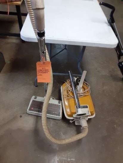 VINTAGE EUREKA CANNISTER VACCUM W/ATTACHMENTS-WORKS