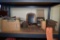 MISC. ITEMS ON BOTTOM TWO SHELVES, CUE BALLS,