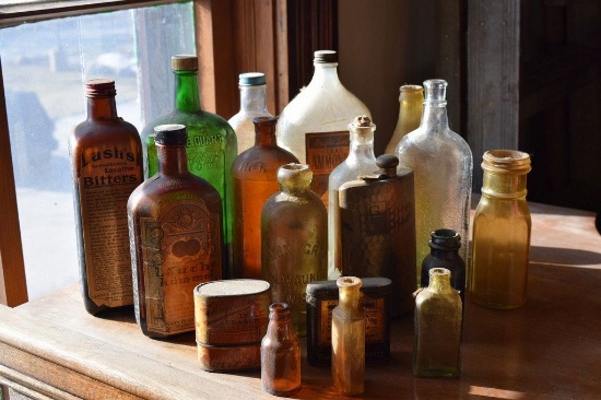 VINTAGE GLASS BOTTLES, TINS AND FLASK