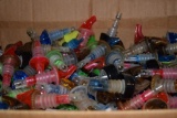 BOX OF ASSORTED PLASTIC JIGGERS