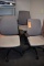 (3) GRAY MATERIAL OFFICE CHAIRS ON CASTERS