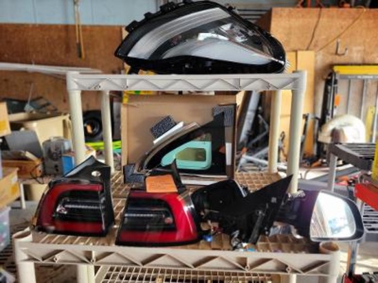 MISC. TESLA PARTS, WINDOW, TAIL LIGHTS, HEADLIGHT ASSEMBLY & USED REAR VIEW MIRROR