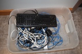 BIN WITH KEYBOARD AND CORDS