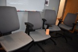 (4) GRAY MATERIAL OFFICE CHAIRS ON CASTERS