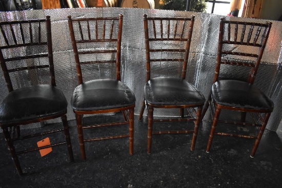 (4) RATTAN STYLE CHAIRS, BLACK PADDED SEATS,