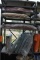 GRAY METAL SHELVING UNIT WITH CONTENTS - ASSORTED CUSHIONS,