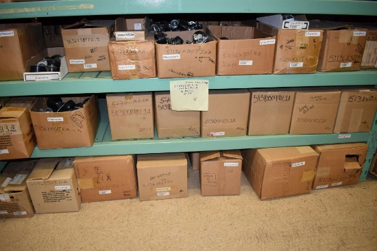 LARGE QUANTITY OF CASTERS ON FLOOR AND LOWER TWO SHELVES