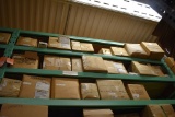 LARGE QUANTITY OF CASTERS ON TOP THREE SHELVES