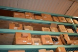 LARGE QUANTITY OF CASTERS ON TOP THREE SHELVES