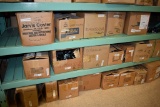 LARGE QUANTITY OF CASTERS ON FLOOR AND LOWER TWO SHELVES