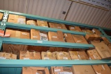 LARGE QUANTITY OF CASTERS ON TOP THREE SHELVES