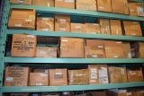 LARGE QUANTITY OF CASTERS ON THREE CENTER SHELVES