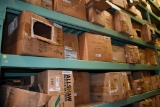 LARGE QUANTITY OF CASTERS ON THREE CENTER SHELVES