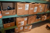 LARGE QUANTITY OF CASTERS ON FLOOR AND LOWER TWO SHELVES