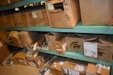 LARGE QUANTITY OF CASTERS ON FLOOR AND LOWER TWO SHELVES