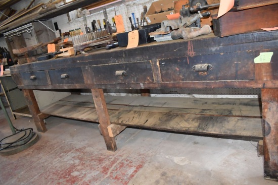 ANTIQUE WOODEN WORKBENCH WITH ORNATE HANDLES,