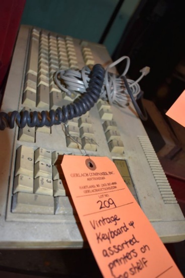 VINTAGE KEYBOARD AND ASSORTED PRINTERS ON TOP SHELF