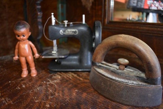 VINTAGE IRON, SMALL SEW MACHINE #48 AND SMALL DOLL