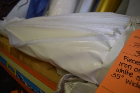 BUNDLE OF IRON ON WHITE SATIN FABRIC, 35" WIDE