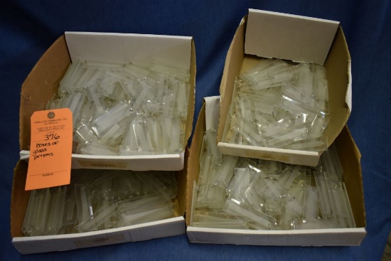 BOXES OF GLASS PRISMS