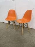 PAIR OF ORANGE MCM MID CENTURY MODERN MOLDED SIDE CHAIRS