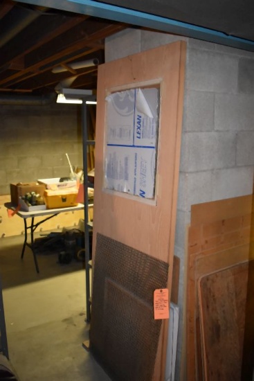 DOOR, PLEXIGLASS, PEGBOARD AND MISC. WOOD LEANING