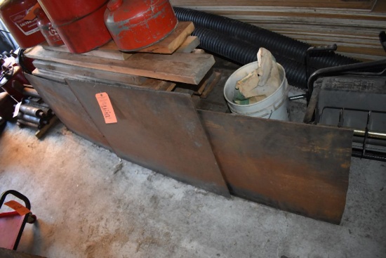(2) STEEL PLATES AND STACK OF LUMBER ITS LEANING AGAINST