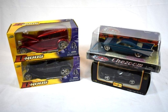 (4) 1/24" SCALE DIE CAST COLLECTORS CARS IN BOXES;