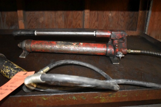 10 TON PORTA-POWER RAM AND HAND PUMP ON LOWER SHELF