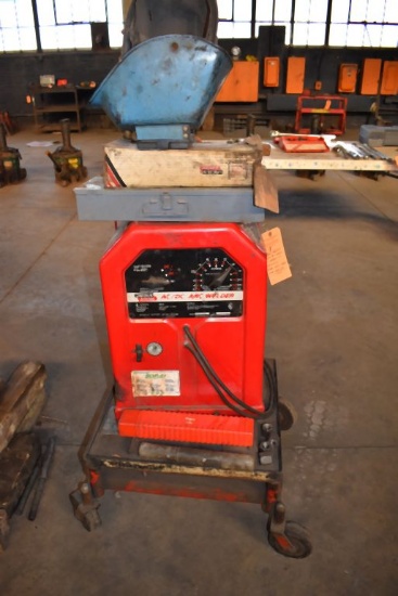 LINCOLN ELECTRIC AC/DC WELDER ON WHEELED CART WITH CONTENTS,