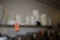 PLASTIC BUCKETS, CONTAINERS AND MISC. ON TOP SHELF