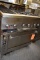 GAS FOUR BURNER RANGE WITH SIDE GRILL GRATE AND