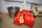 (3) FUEL CANS AND METAL BUCKET
