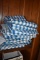 STACK OF BLUE AND WHITE CHECKED TABLECLOTHS, 52