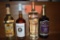 (4) BOTTLES; SMIRNOFF PEACH, SCREWBALL WHISKEY,
