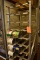 STAINLESS CAN RACK ON CASTERS, NO CONTENTS,