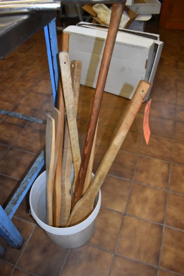 BUCKET WITH MISC. WOODEN PADDLES, BUILDING 2 KITCHEN