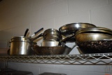 ASSORTED FRYING PANS AND KETTLES ON TOP SHELF,