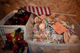 BIN WITH MAY DAY DECORATIONS AND BOX WITH BALLOON WEIGHTS