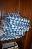 STACK OF BLUE AND WHITE CHECKED TABLECLOTHS, 52