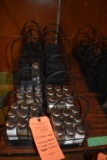 (19) BLACK METAL CONDIMENT HOLDERS AND GLASS SALT