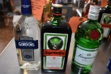 (3) BOTTLES OF JAGERMEISTER GORDONS VODKA TANQUERAY,