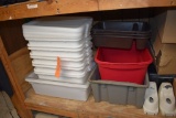 LOT OF PLASTIC BINS AND TUBS ON BOTTOM SHELF