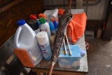 WOODEN TABLE WITH CONTENTS - BAGS, FLAGS, BLEACH, ETC.