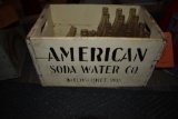 AMERICAN SODA WATER CO. CRATE WITH (16) BOTTLES