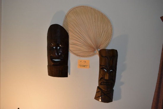 (2) TIKI STYLE WOODEN CARVED HEADS & NATURAL PALM LEAF