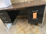 BLACK METAL DESK WITH BROWN WOODGRAIN FORMICA TOP,