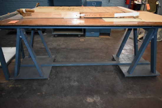 4' x 8' WOODEN WORK TABLE ON CASTERS, SAWHORSE STYLE BASE, NO CONTENTS